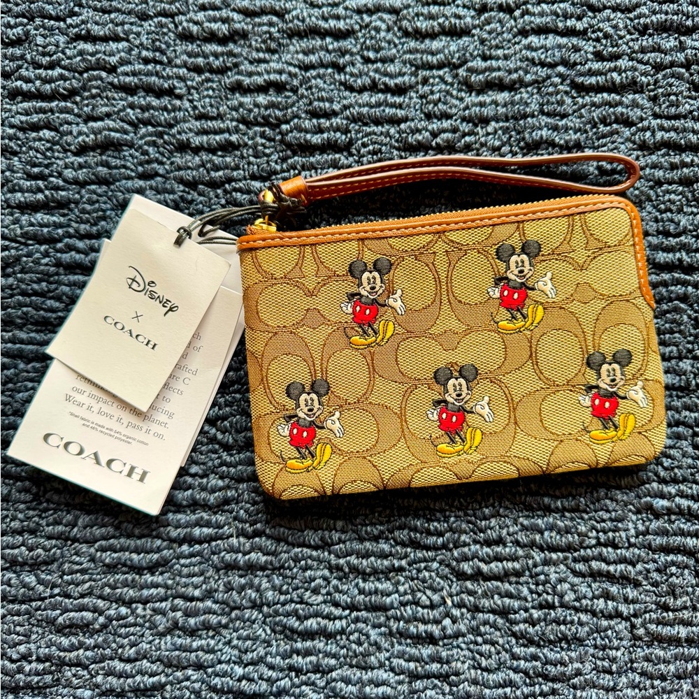Coach x Disney Corner Zip Wristlet Mickey Mouse Signature Jacquard Logo CN033